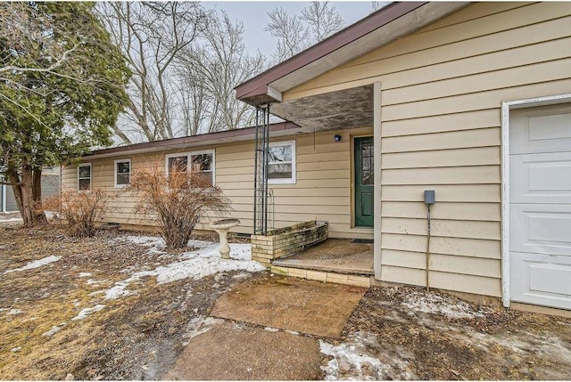 entrance to property with a garage