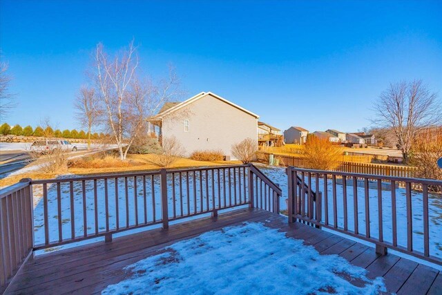 wooden deck featuring a residential view