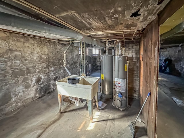 unfinished basement with gas water heater