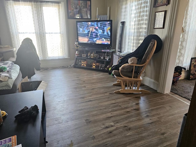 sitting room with wood finished floors