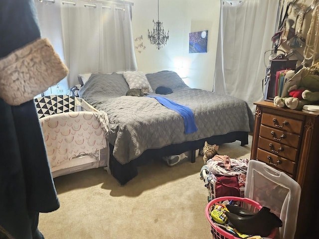 bedroom featuring light colored carpet