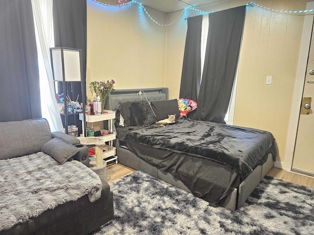 bedroom with wood finished floors