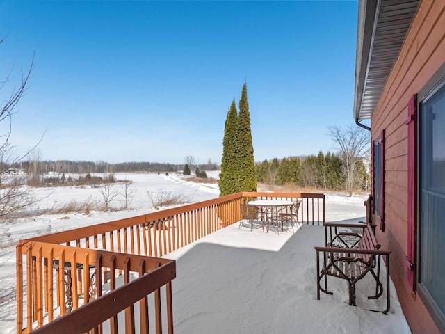 view of snow covered deck