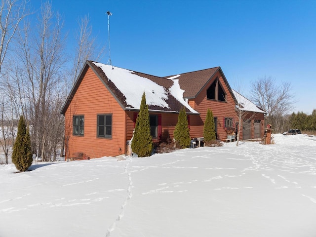 view of snow covered property