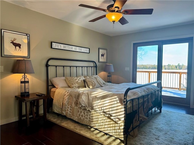 23310 Clam Lake Rd, Clam Lake, WI 54517 - bedroom with dark wood-style floors, access to outside, baseboards, and ceiling fan