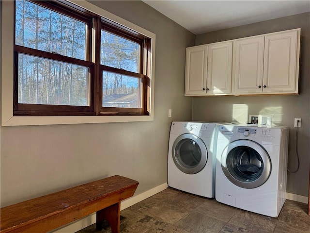 23310 Clam Lake Rd, Clam Lake, WI 54517 - laundry area featuring washer and dryer, cabinet space, and baseboards