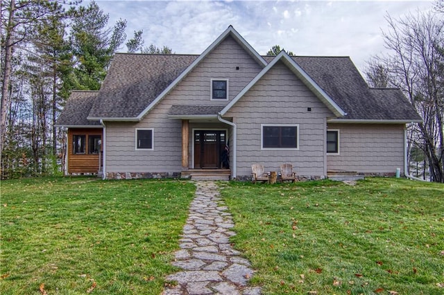 23310 Clam Lake Rd, Clam Lake, WI 54517 - view of front of home featuring a front lawn and a shingled roof