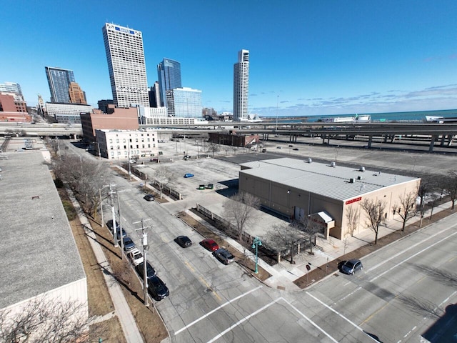 birds eye view of property featuring a city view