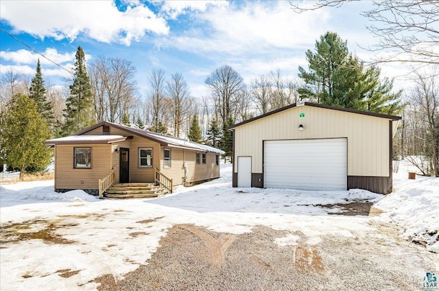 43240 County Highway D, Cable, WI 54821 - view of front of house featuring a garage and an outdoor structure