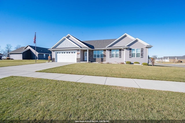 view of front of home with driveway, a garage, and a front yard