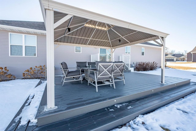 view of snow covered deck