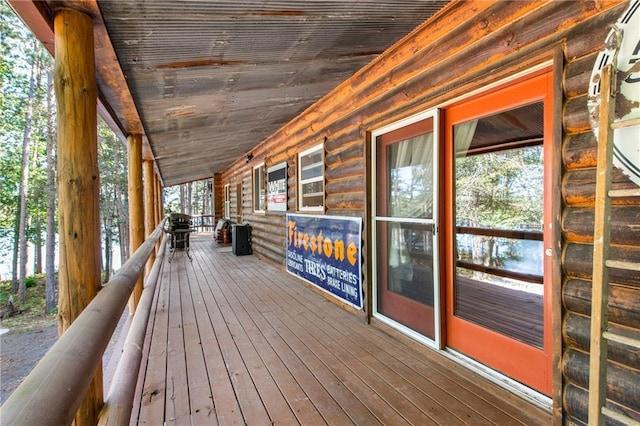 deck featuring a grill