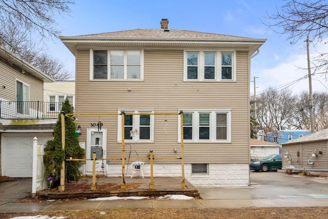 view of front of home with a chimney