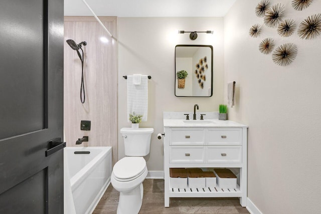 full bathroom with vanity, toilet, bathtub / shower combination, and baseboards