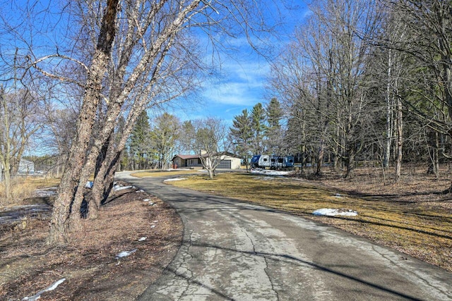 view of road featuring driveway