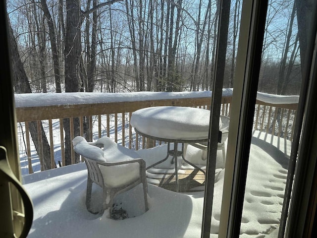 view of snow covered deck