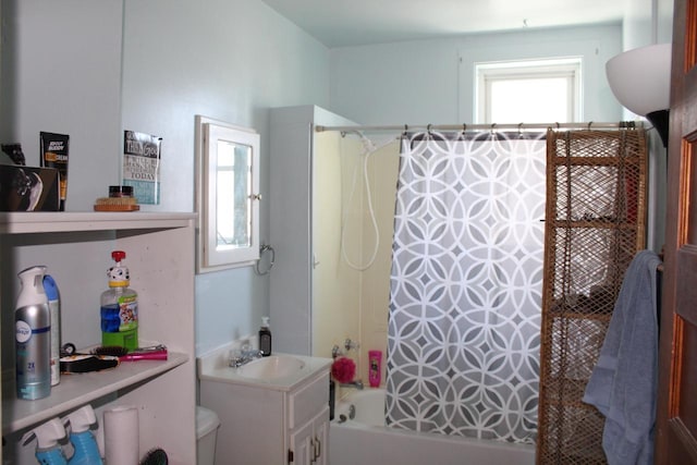 full bath with vanity, toilet, and shower / bathtub combination with curtain