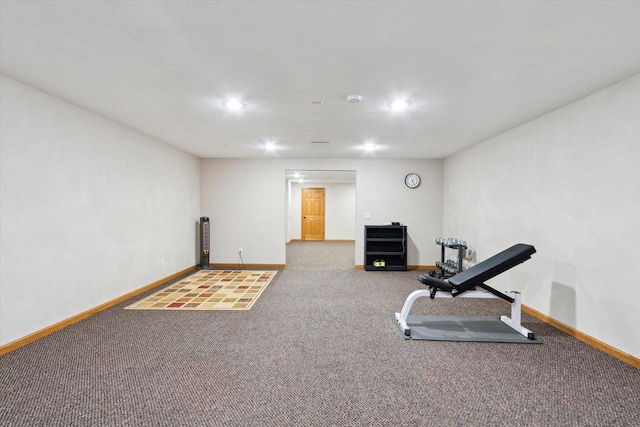 exercise area featuring carpet, baseboards, and recessed lighting