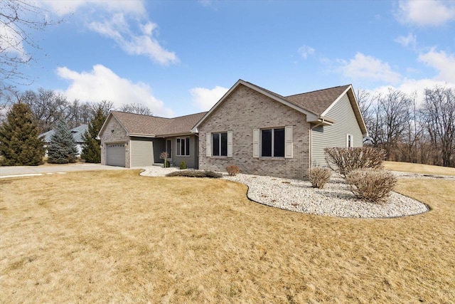 ranch-style home with a front yard, brick siding, driveway, and an attached garage