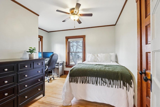 bedroom with ornamental molding, ceiling fan, and light wood finished floors