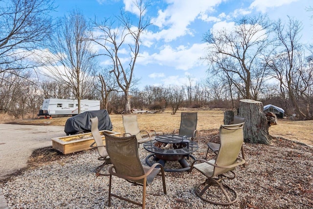 exterior space with a fire pit