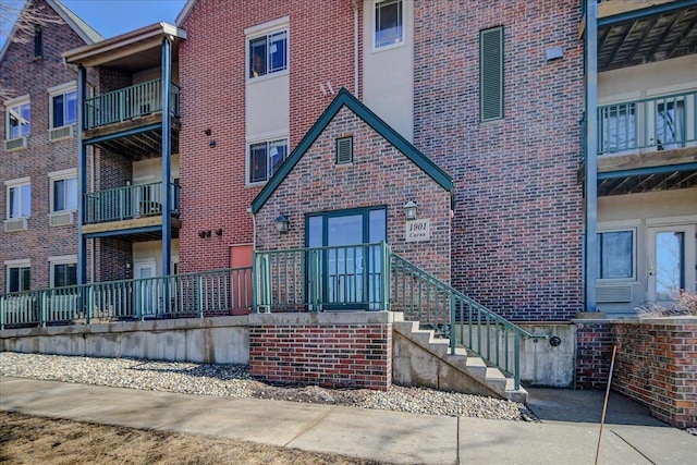 exterior space with brick siding