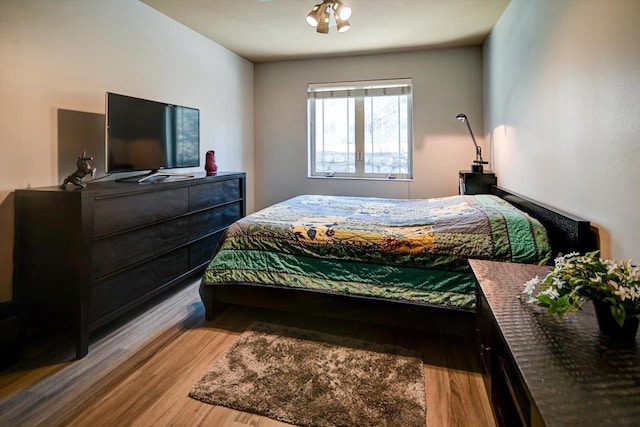 bedroom featuring light wood-type flooring