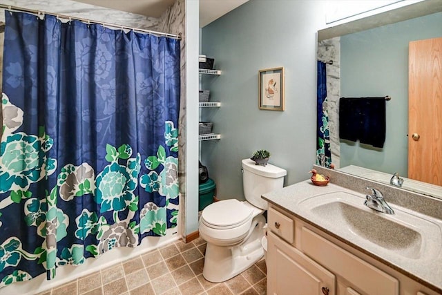 full bathroom featuring toilet and vanity