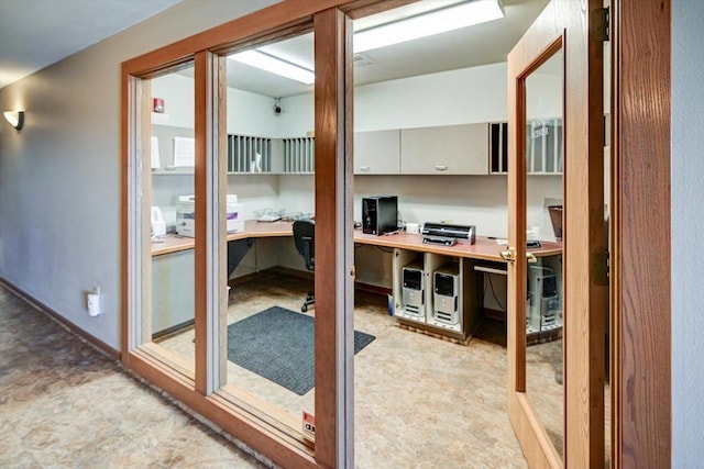 office featuring built in desk