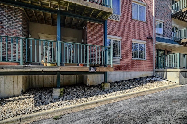 exterior space featuring brick siding