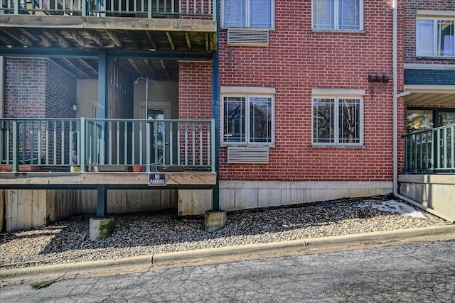 view of side of property with brick siding