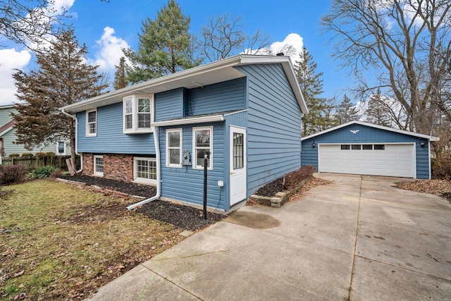 view of front of home featuring an outbuilding and a garage