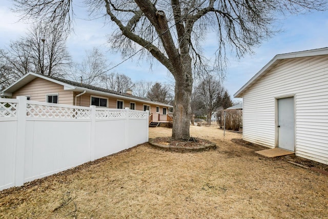 view of yard featuring fence