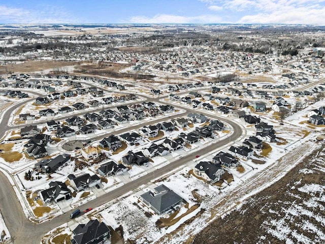 birds eye view of property with a residential view