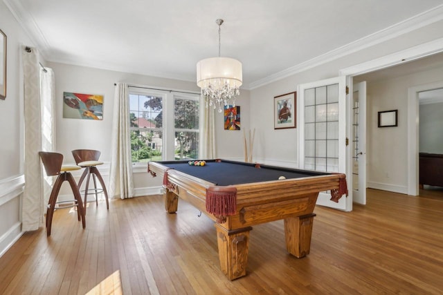 recreation room with crown molding, baseboards, billiards, and light wood-style floors