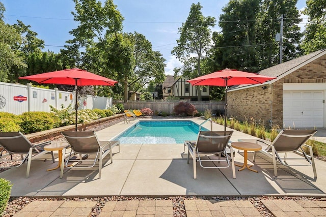 view of swimming pool featuring fence private yard, a fenced in pool, and a patio