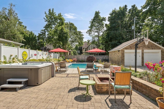 view of swimming pool with a fenced in pool, a fenced backyard, an outdoor structure, and a hot tub