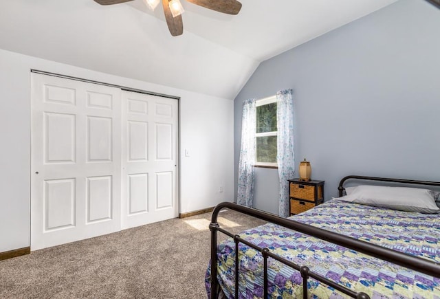 297 Debuhr Ln, Platteville, WI 53818 - bedroom featuring carpet floors, a closet, a ceiling fan, vaulted ceiling, and baseboards
