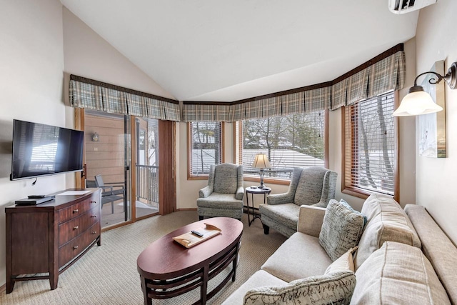 living room featuring light carpet and vaulted ceiling