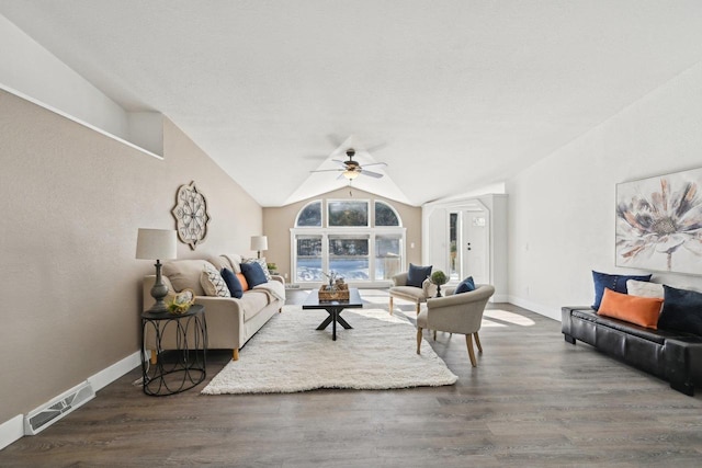 living area featuring lofted ceiling, baseboards, visible vents, and dark wood-type flooring