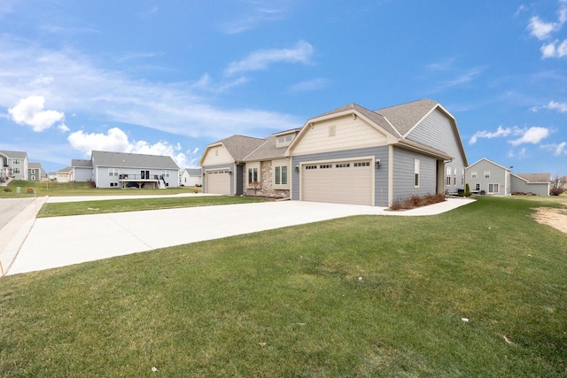 craftsman inspired home with a garage, a residential view, driveway, and a front lawn