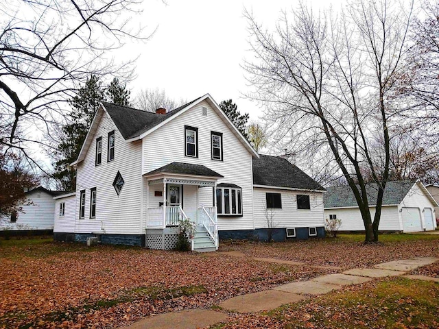 651 Wisconsin River Dr, Port Edwards, WI 54469 - view of front facade featuring a shingled roof and a chimney