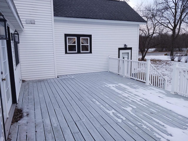 view of snow covered deck