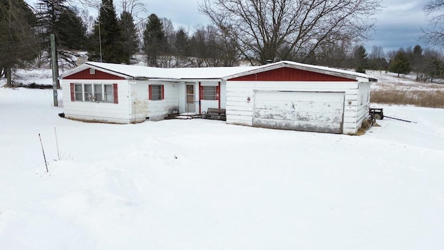 single story home with a garage and crawl space