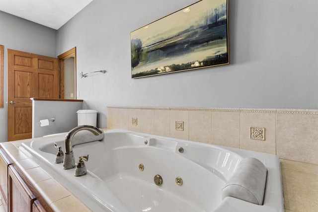 bathroom with a whirlpool tub