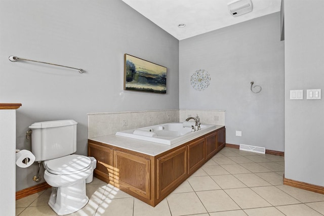 full bathroom with toilet, visible vents, baseboards, a bath, and tile patterned floors