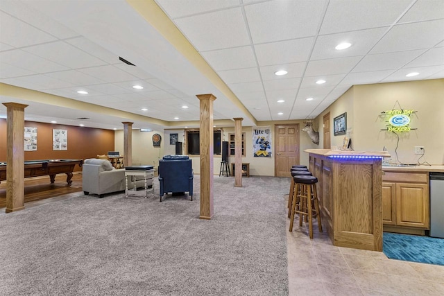 interior space featuring a dry bar, ornate columns, dishwasher, and pool table