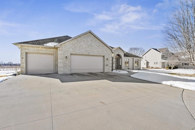 view of front facade featuring a garage and concrete driveway