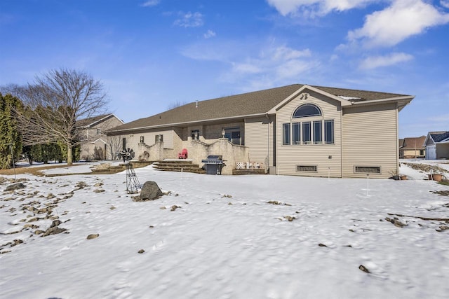 view of snow covered property