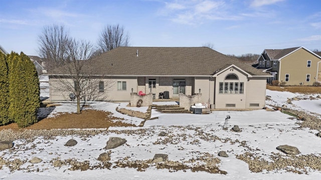 view of snow covered property